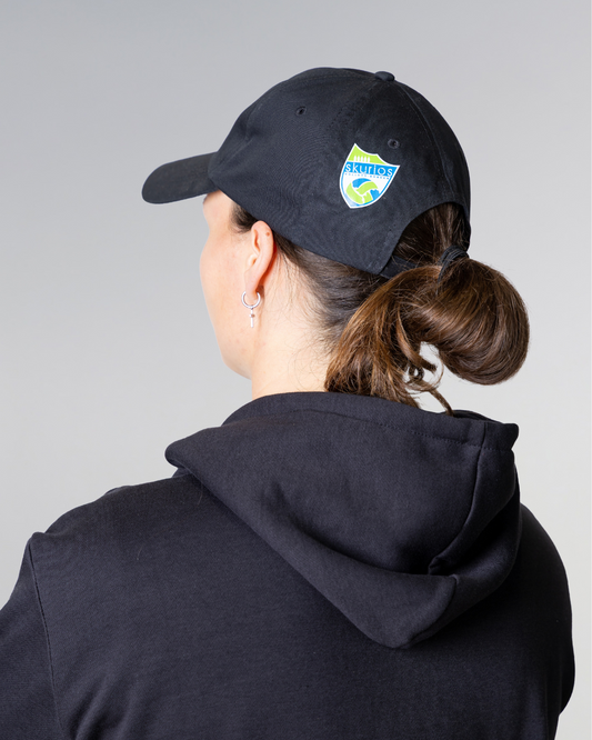 cap with logo of volleyball team skurios and model from back